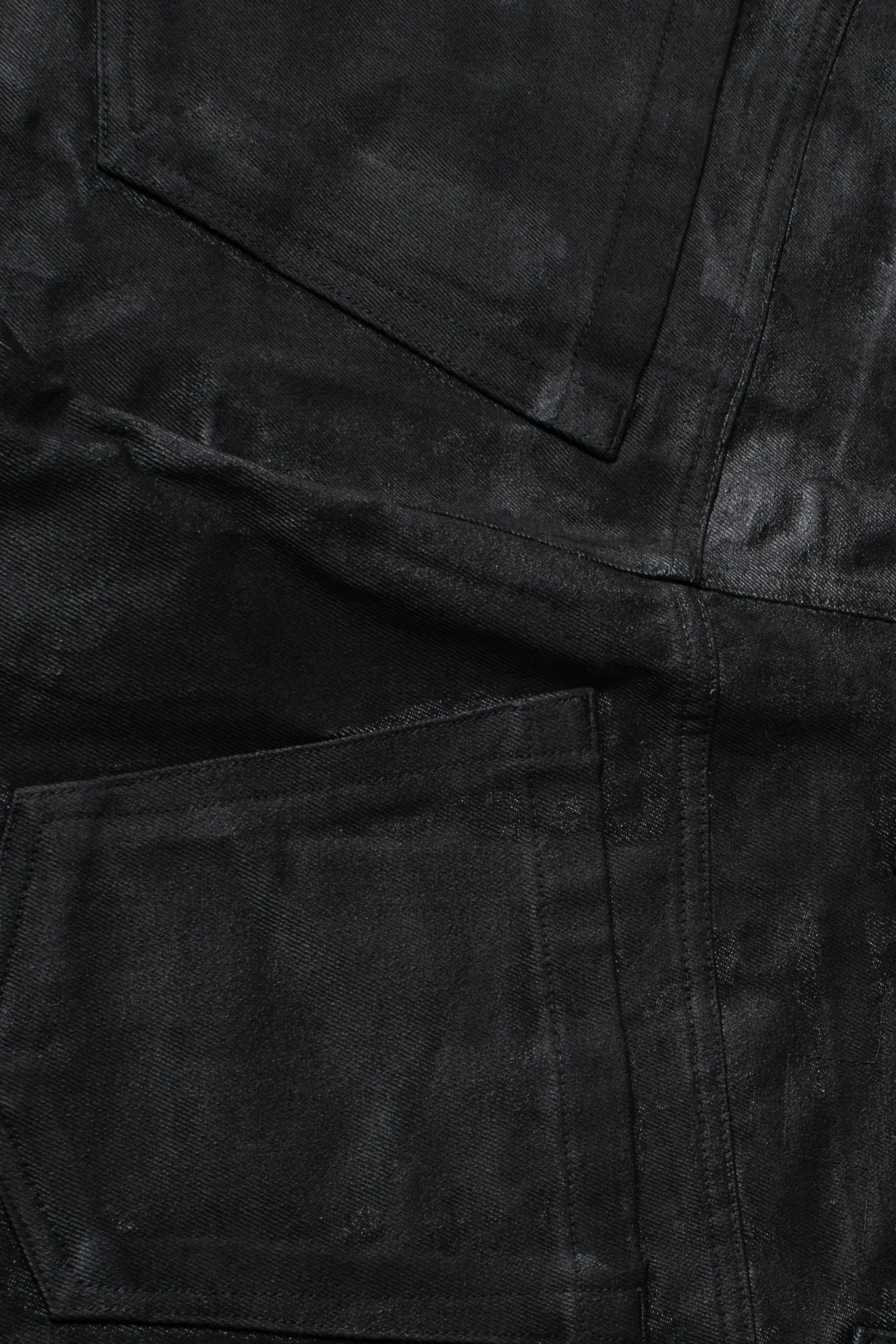COATED STACKED JEANS