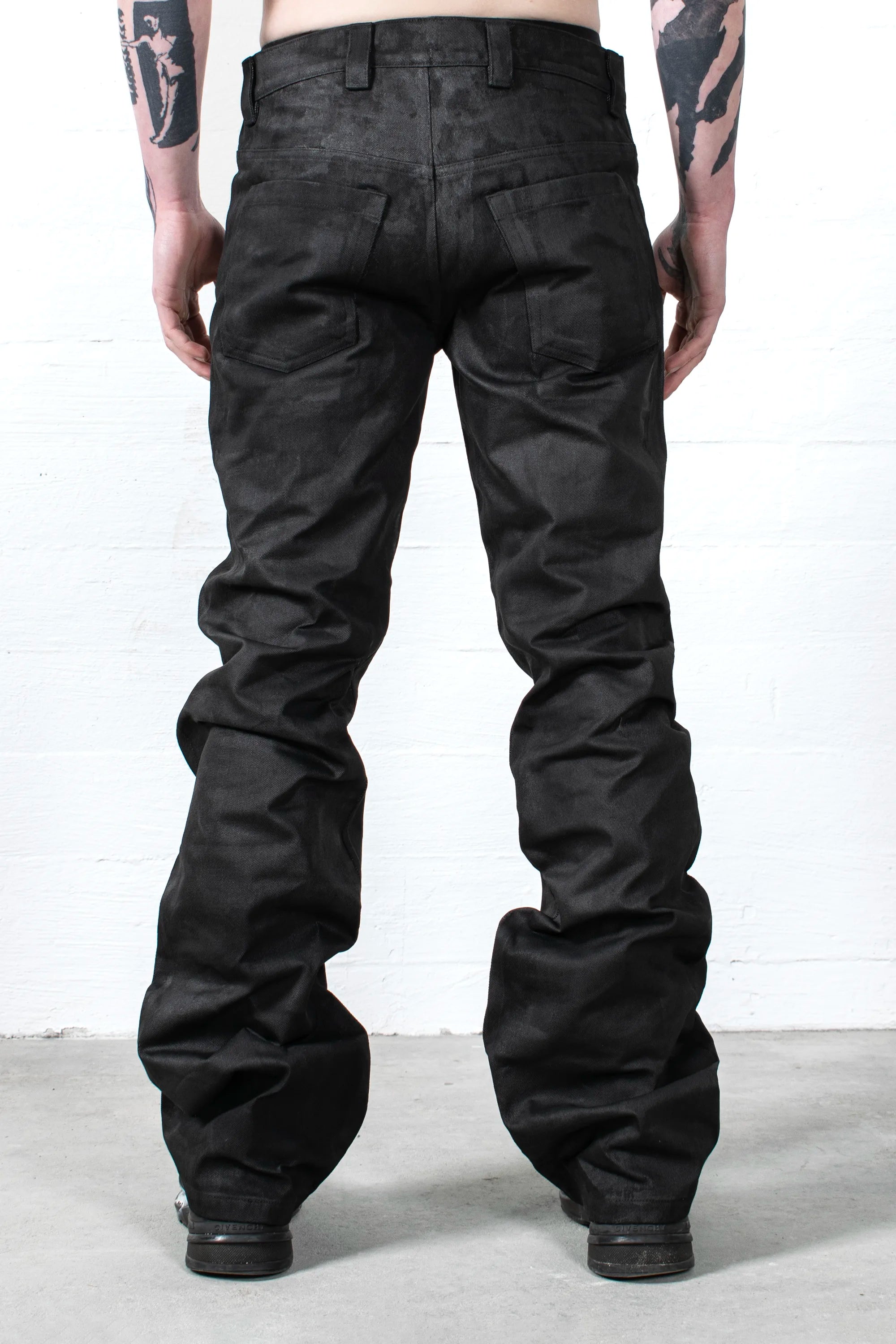 COATED STACKED JEANS