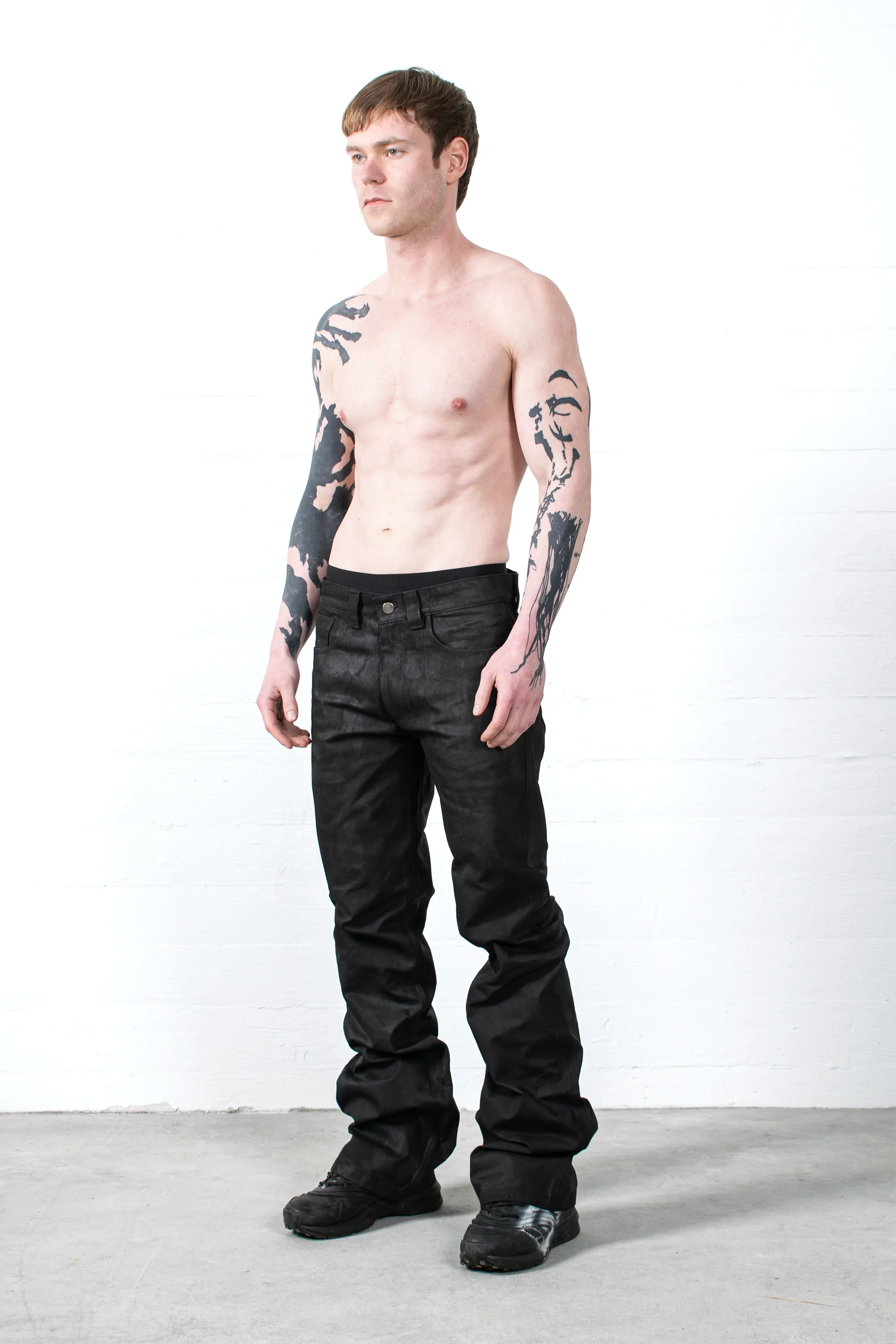 COATED STACKED JEANS