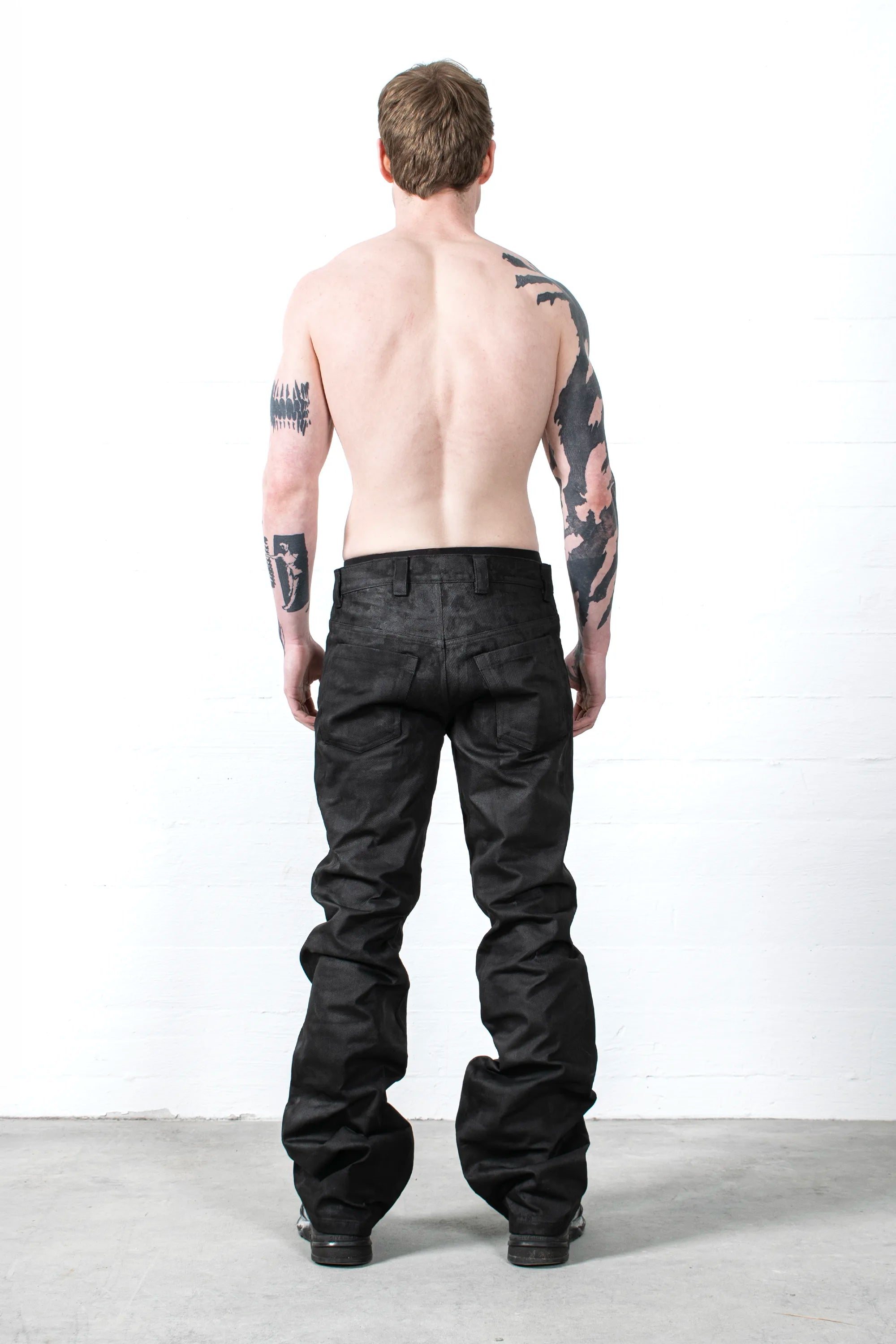 COATED STACKED JEANS